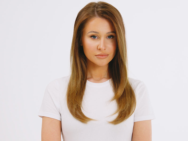 Model with sleek brown hair styled using the Airshot Pro.