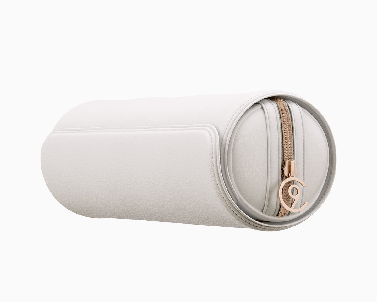 A slightly zoomed-in image of the CLOUD NINE Luxury White Leather Roll Bag on a white background, positioned at an angle to show the rose gold C9 logo on the zip.