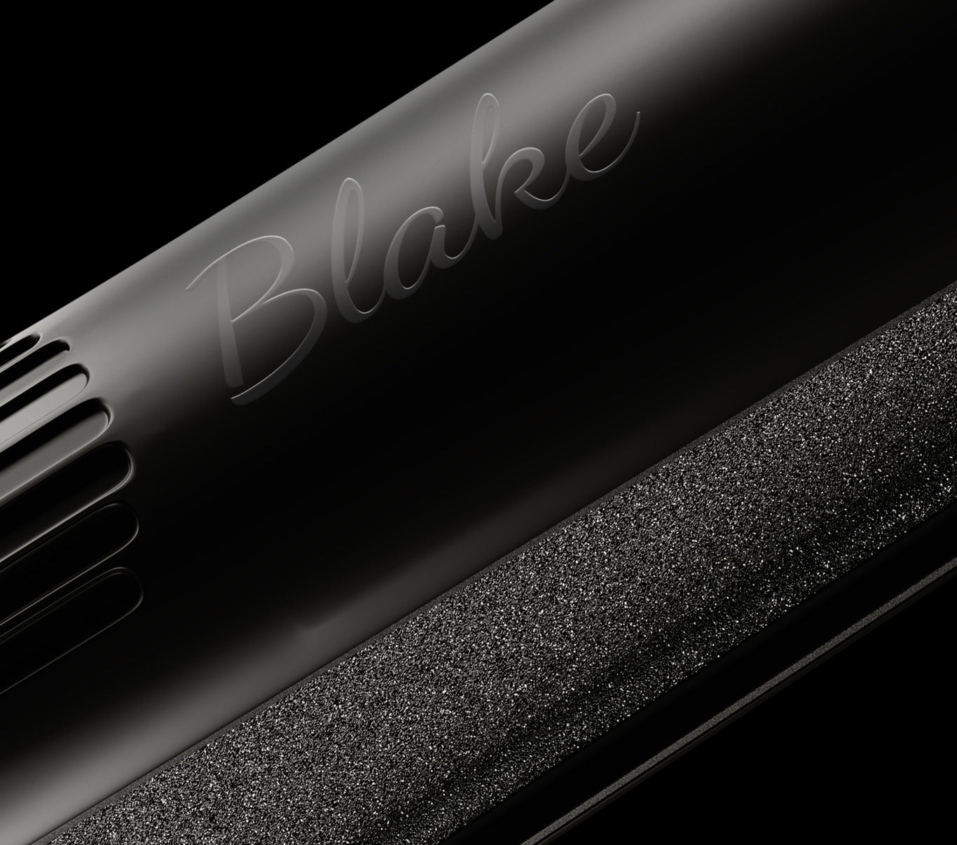 Close-up of CLOUD NINE hair straightener plates with Blake monogrammed.