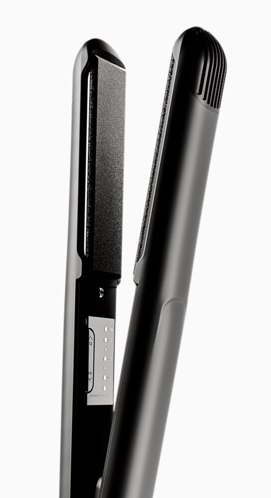 A black CLOUD NINE hair straightener on a white background.