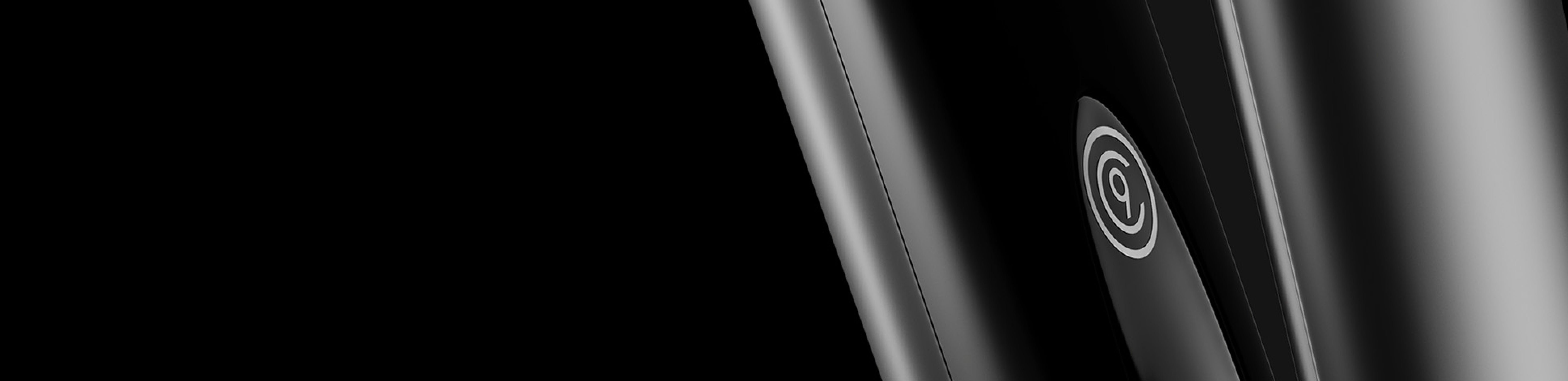 Close up on a black CLOUD NINE Iron on a black background.