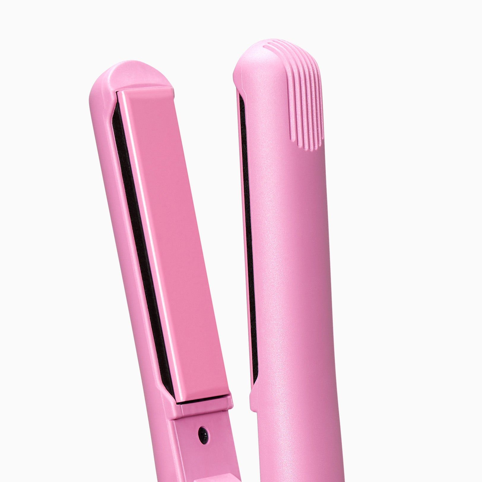 Close up of the mineral infused plates on the Poodle Skirt Pink Retro Iron.