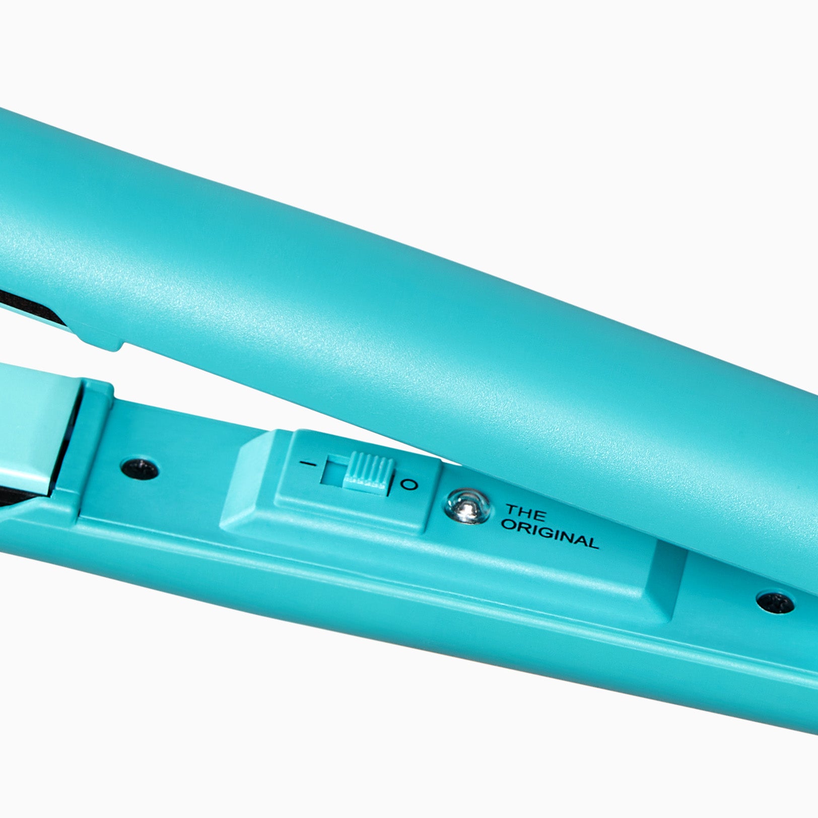 Close up of the retro power on button on the Soda Fountain Blue CLOUD NINE Retro Iron.