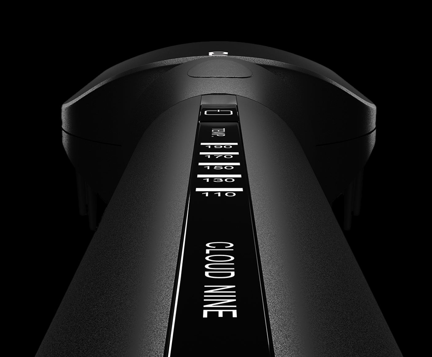 A close-up looking up at the different settings of the black CLOUD NINE Original Hot Brush.