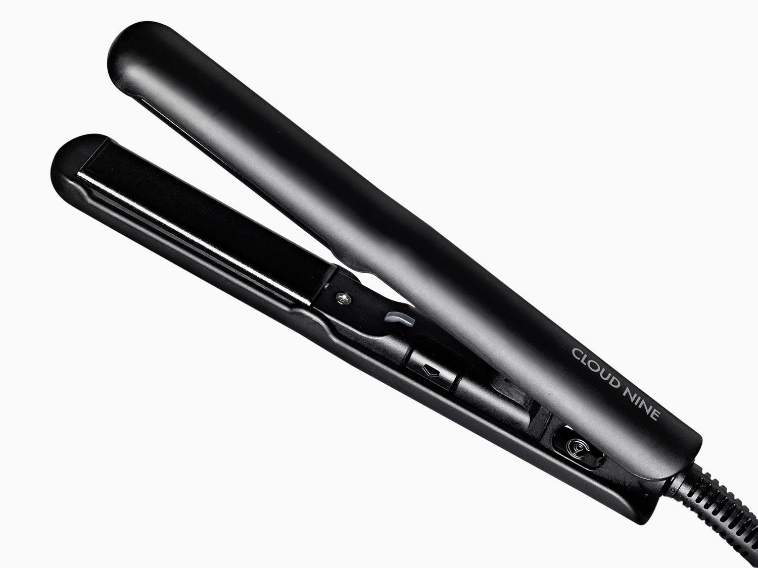 A image of the black CLOUD NINE Micro Iron placed diagonally on a white background.