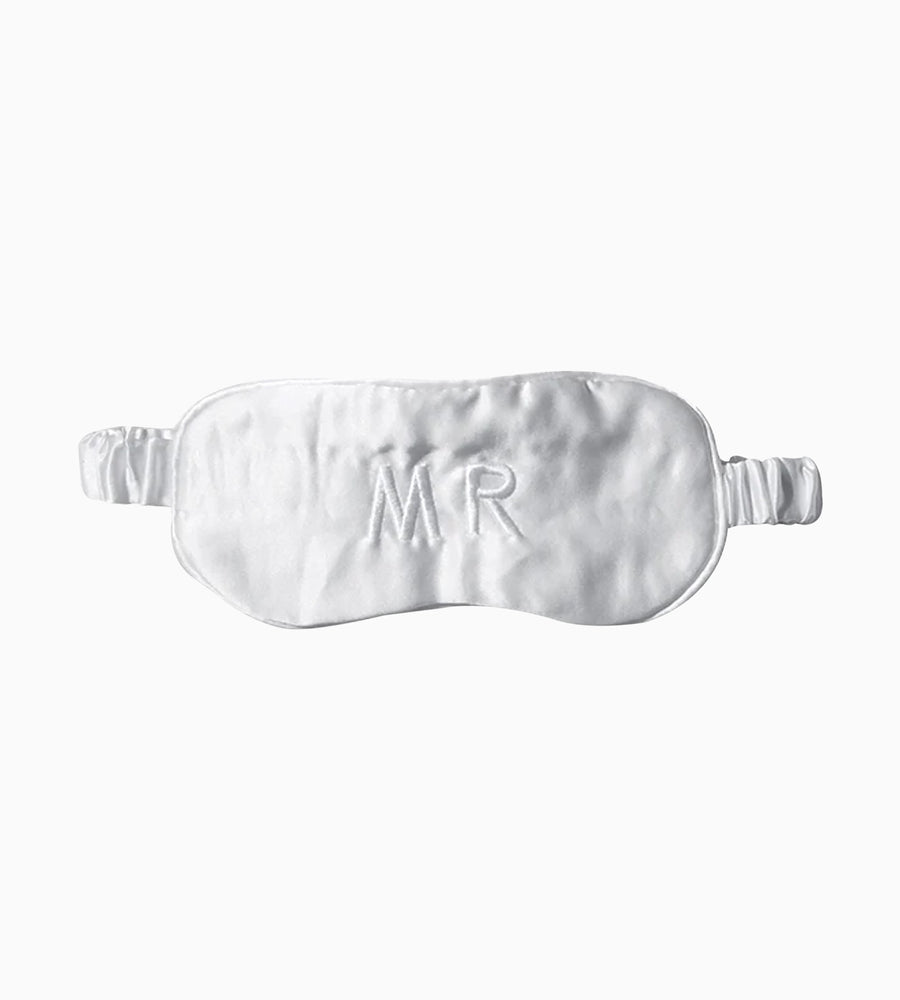 White silk eyemask with 'MR' embroidery. 
