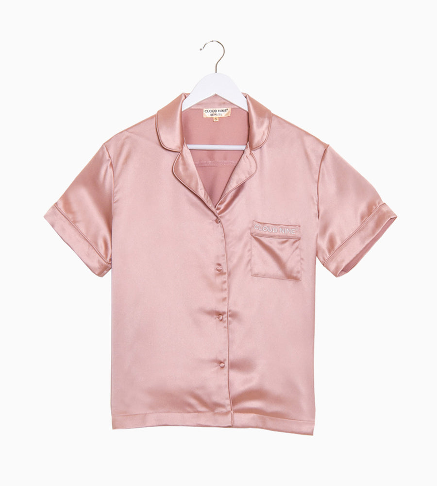 Pink short sleeved silk pyjama shirt featuring CLOUD NINE branding on the breast pocket.