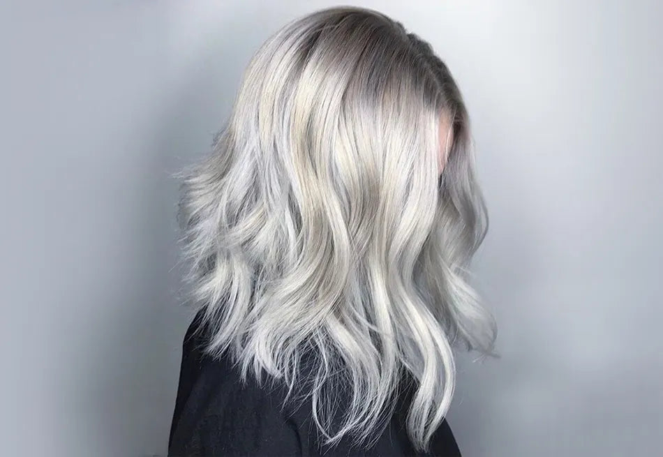 Image of a model with silver wavy hair.