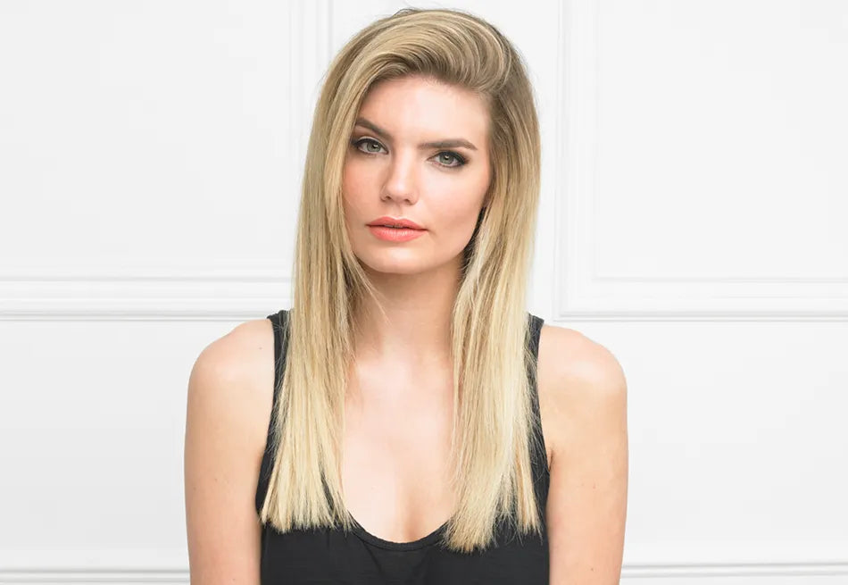 Image of a model with mid-length blonde straight hair.