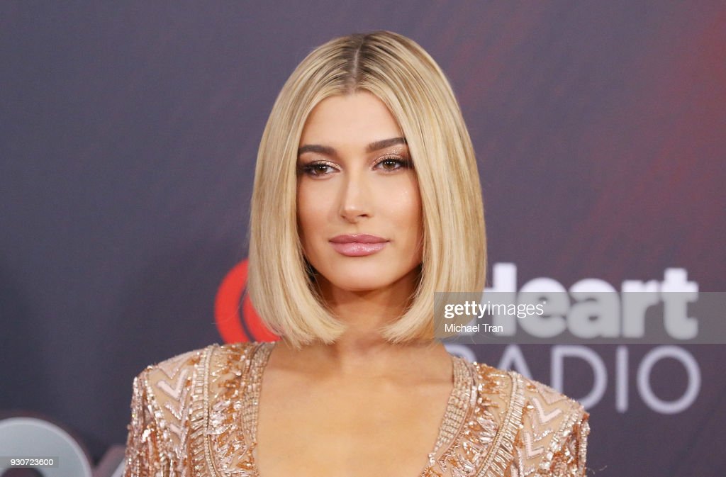 Image of Hailey Bieber with a blonde bob.