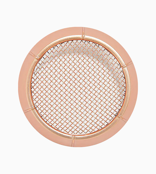 A rose gold hair dryer filter attachment.