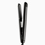A black CLOUD NINE Original Iron hair straightener.