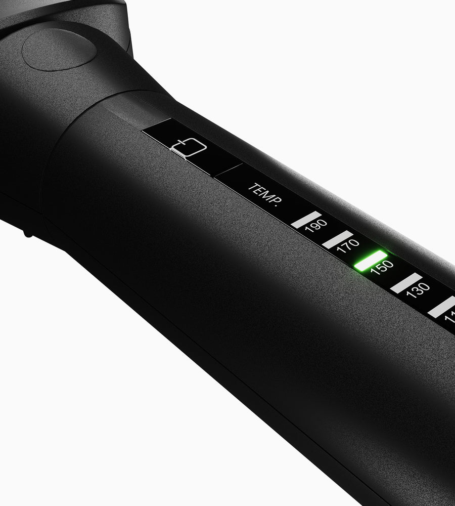 Close-up image of variable temperature controls on black CLOUD NINE Curling Wand on white background.