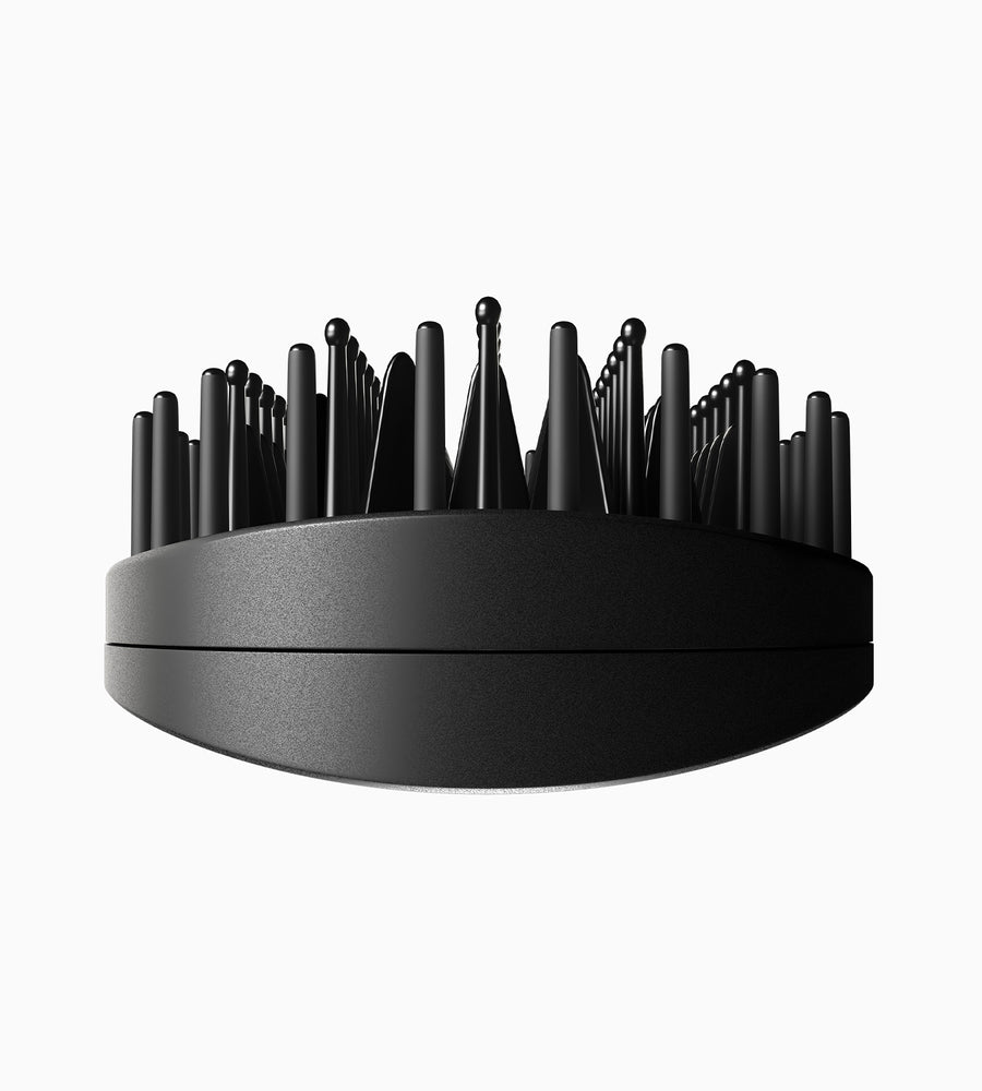 Close up of the flat bristles of the Hot Brush which creates the perfect amount of pull.
