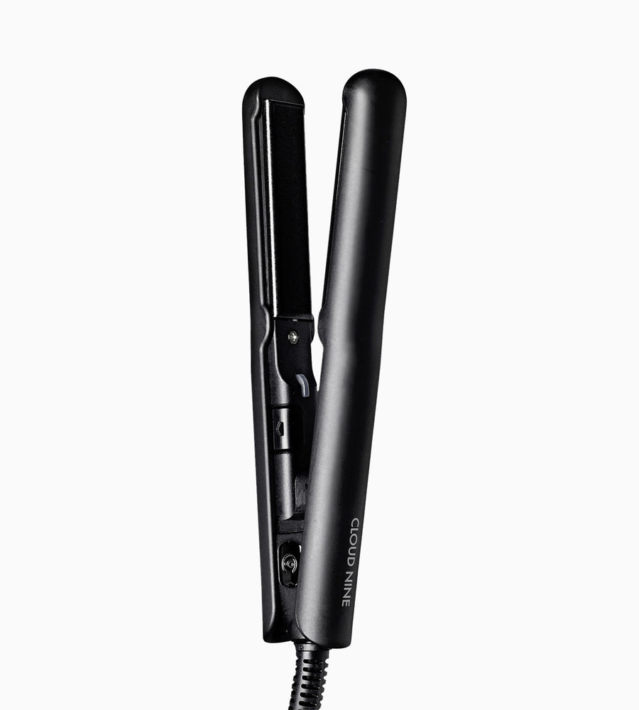 Vertical full product image of the black CLOUD NINE Micro Iron.