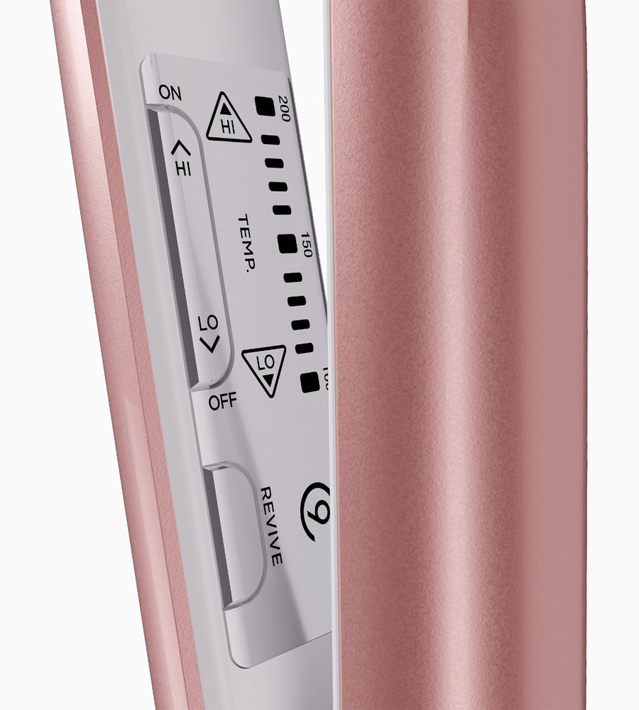 Cropped view of a pink Original Iron Pro hair straightener's temperature controls.