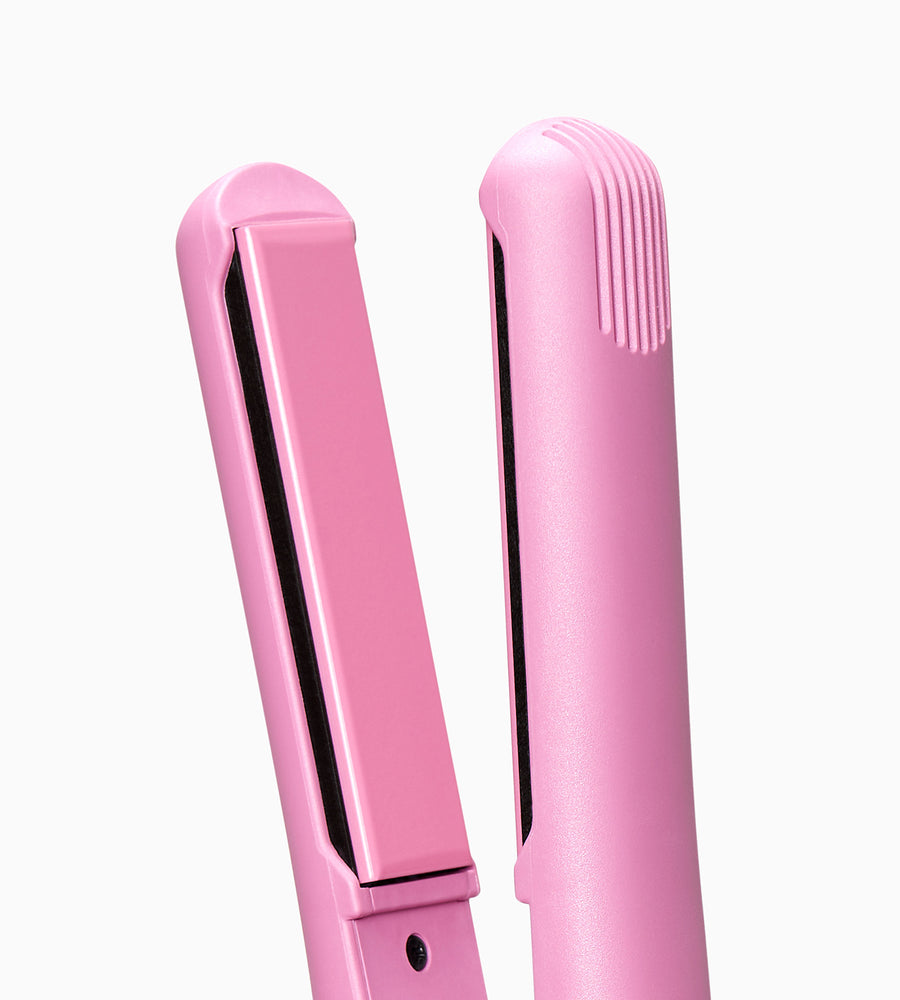 Close-up image of pink CLOUD NINE straighteners showing plates on white background.