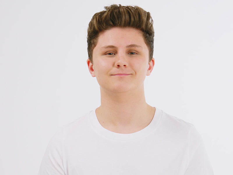 Model with a textured quiff styled with the Micro Iron.