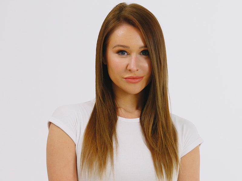 Model with long straight brown hair styled with the Wide Iron Pro.