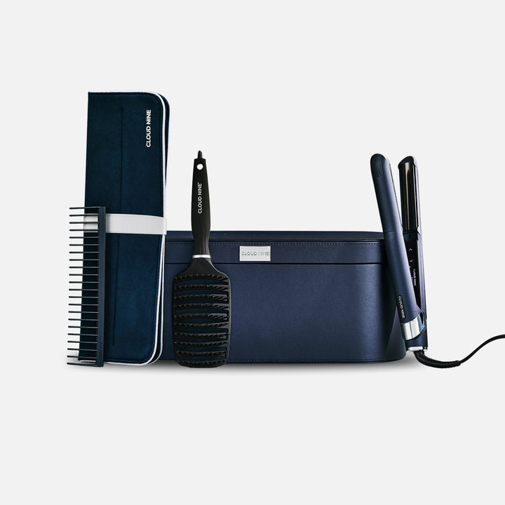 The Contouring Original Iron turned on and angled towards the screen with promotion for Free Travel Hair Dryer worth £99.