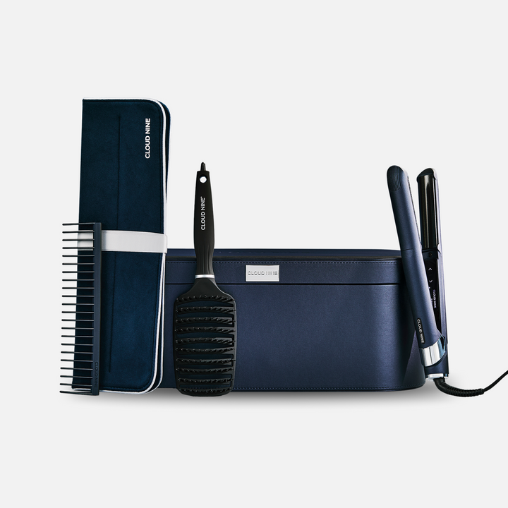 The Contouring Original Iron turned on and angled towards the screen with promotion for Free Travel Hair Dryer worth £99.