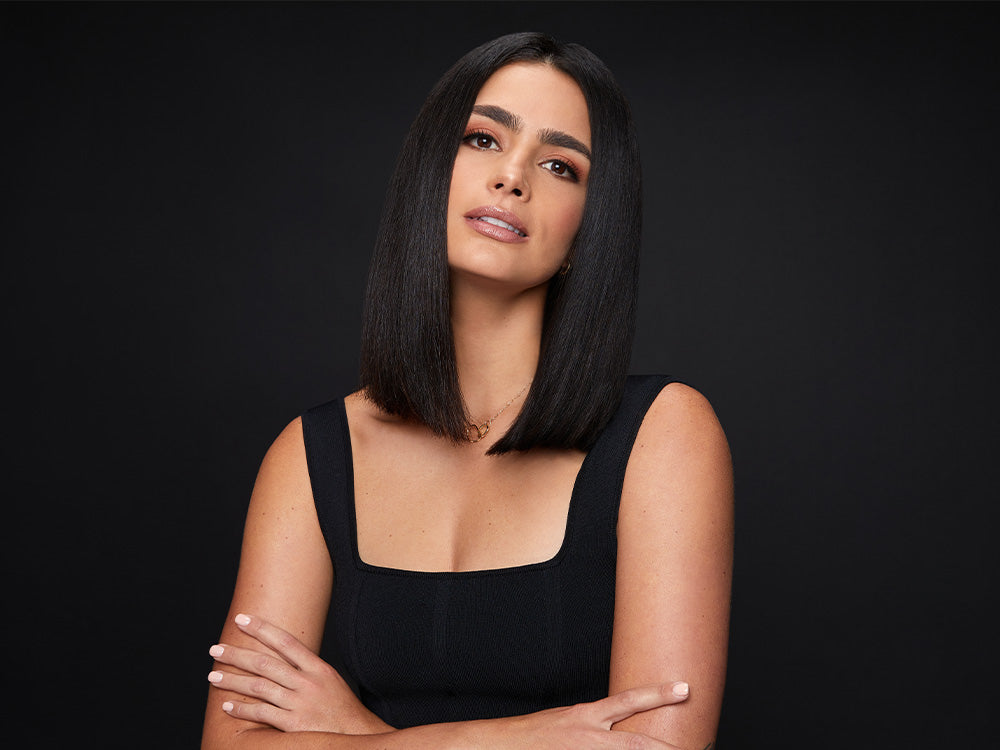 Model with a sleek black bob.