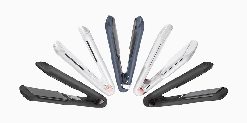 A fan of different CLOUD Nine hair straighteners on a white background