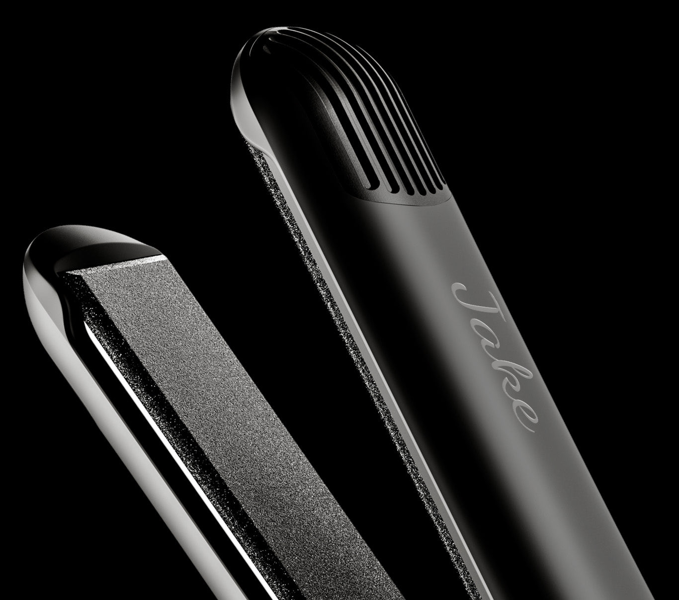 Close-up of black CLOUD NINE hair straightener monogrammed with the name Jake.