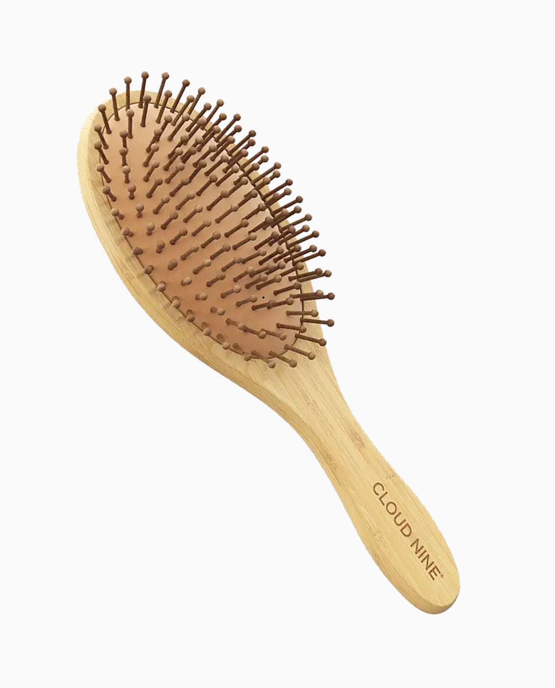 A CLOUD NINE bamboo brush.