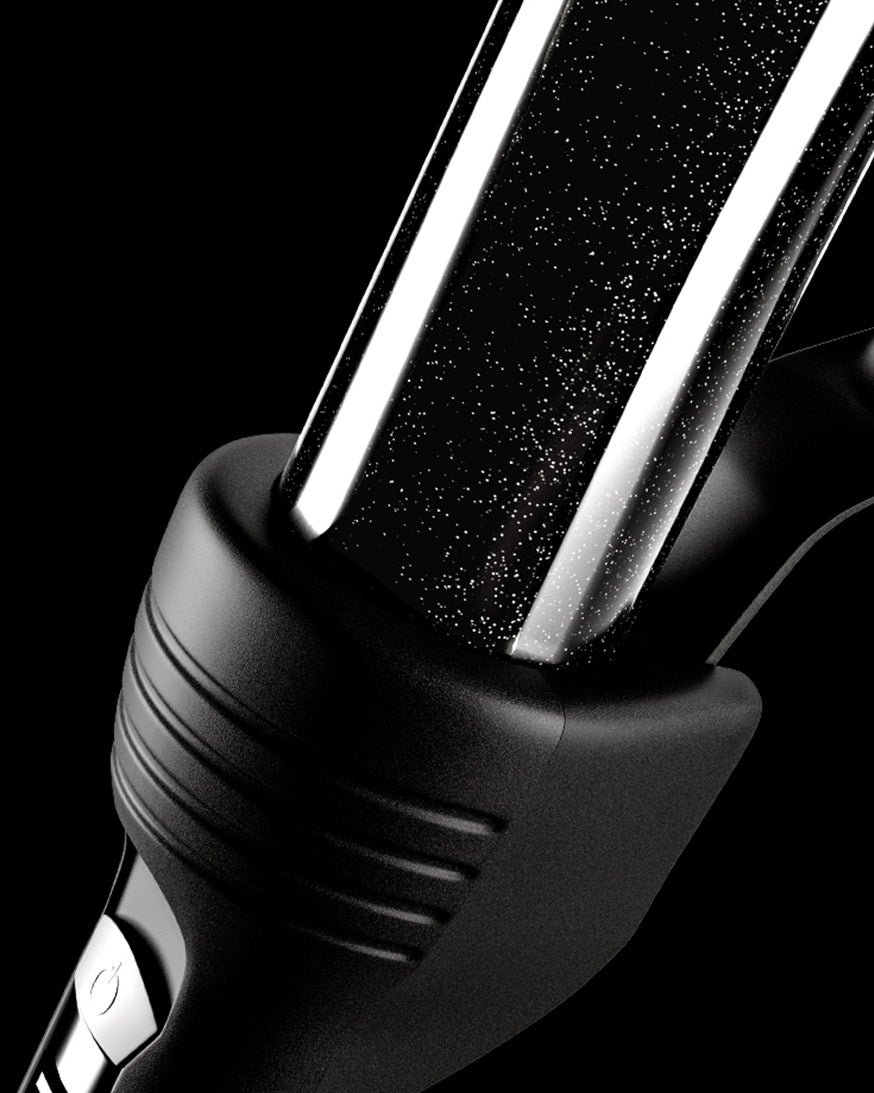 Close-up showing the mineral infused barrel of a CLOUD NINE Curling Wand.