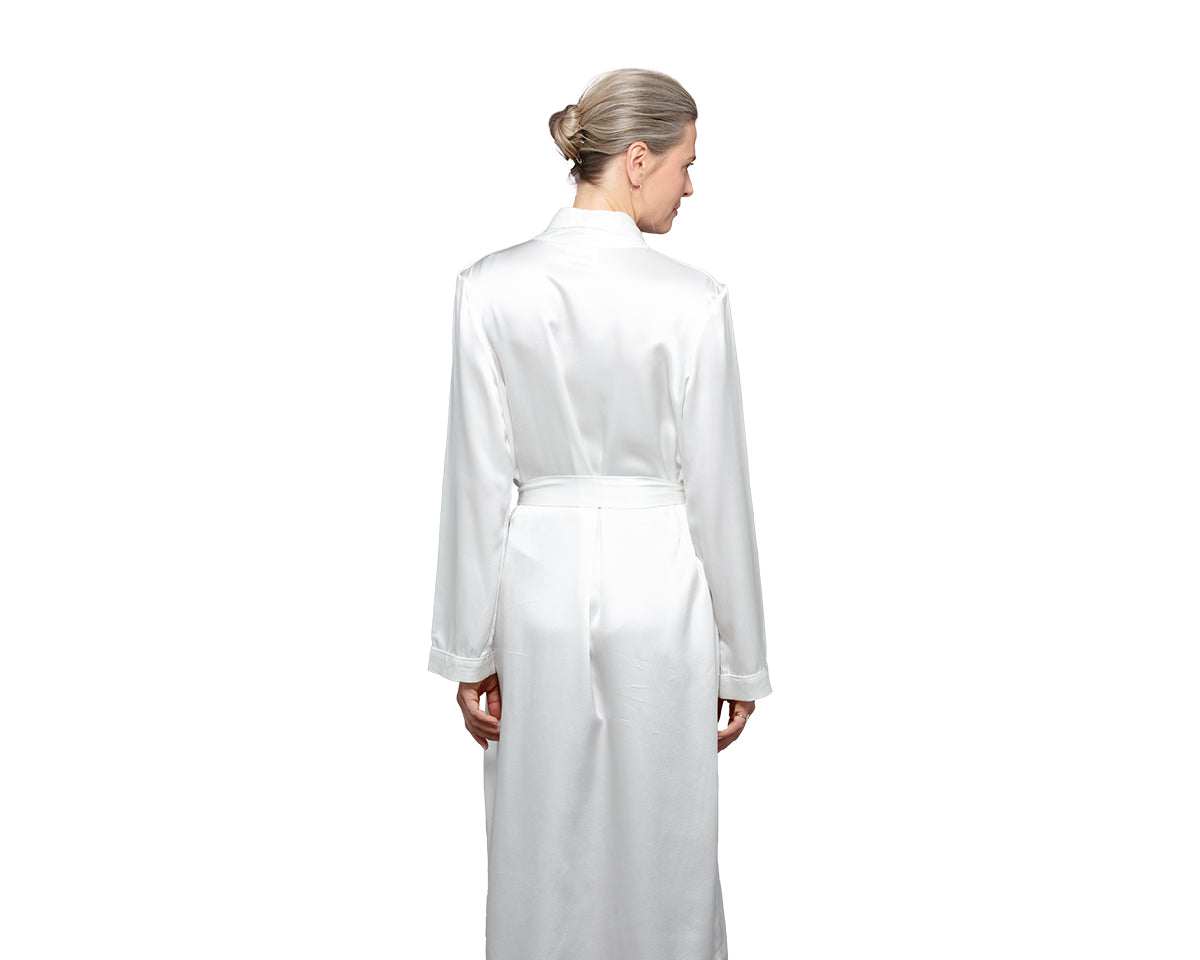 An image showing the back of the CLOUD NINE white silk robe.