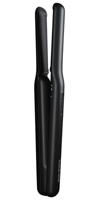Vertical full product image of the black CLOUD NINE Original Cordless Iron.