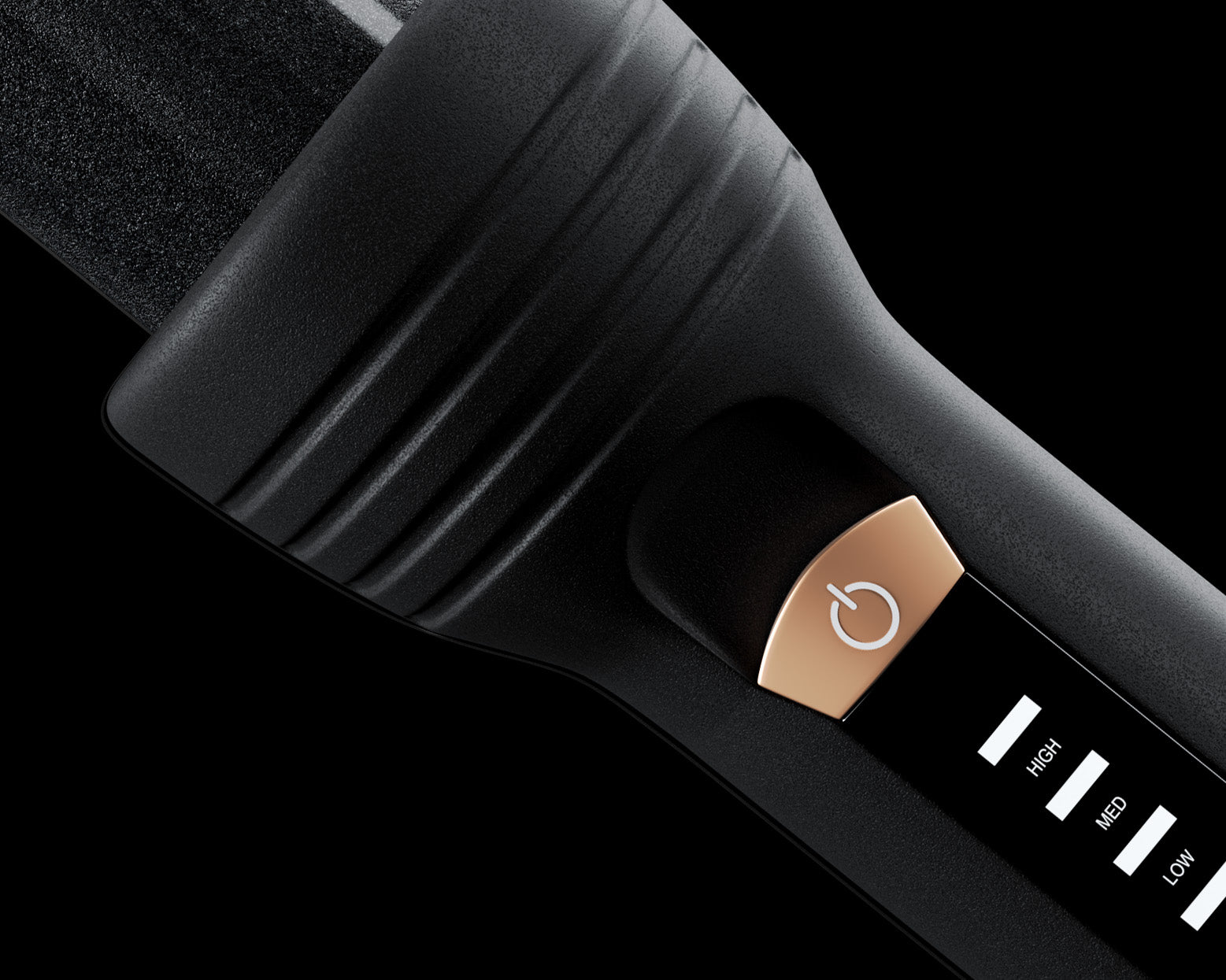 Close-up of the variable temperature setting and the power button on the Alchemy Collection Curling Wand.