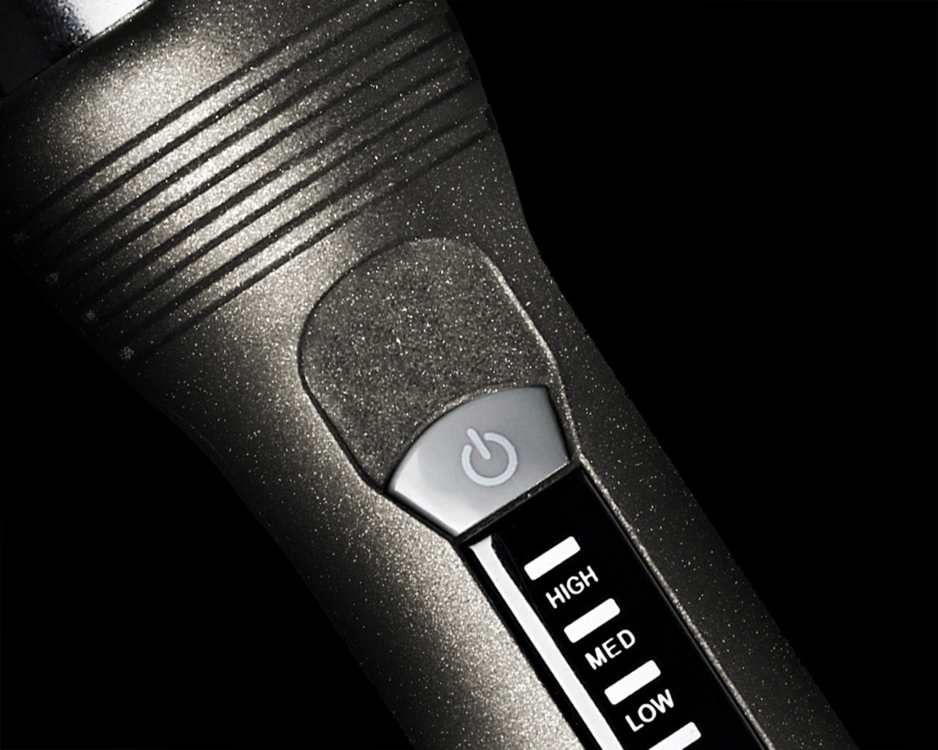 Close up of the power button and variable temperature settings on the Sericite Collection Curling Wand.