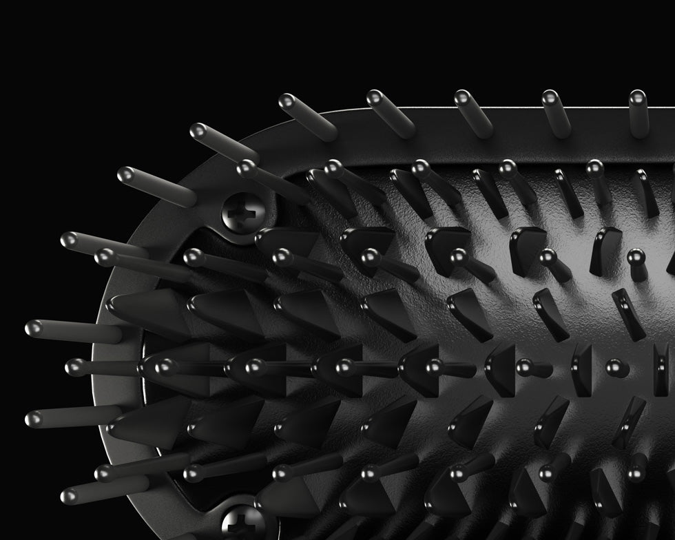 A close-up of the CLOUD NINE Original Hot Brush bristles for Hair Tame Tessellation against a black background.