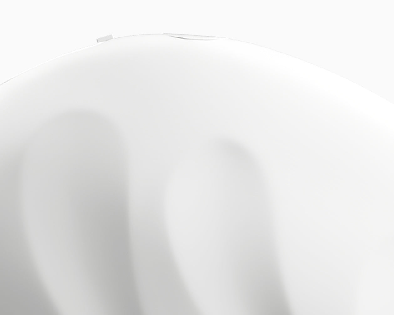 A super close-up image of the top edge of the Redefine beauty device.