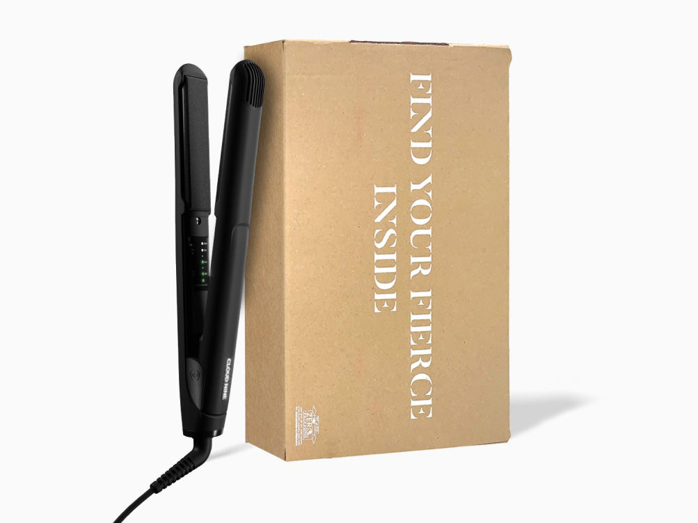 Image of black CLOUD NINE iron against fully recyclable packaging. 